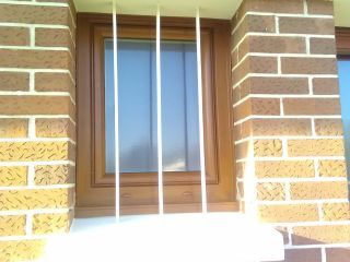 Porte d'Entrée ALU chêne doré et fenêtres PVC T70
