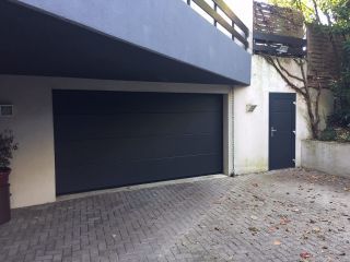 Portes de garage sectionnelle + portillon ACIER - PGS EVOLUTION