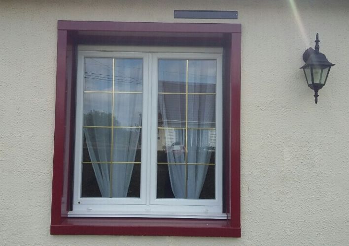Fenêtre PVC T70 avec croisillons laitons.