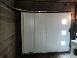 Porte de garage sectionnelle latérale TRYBA