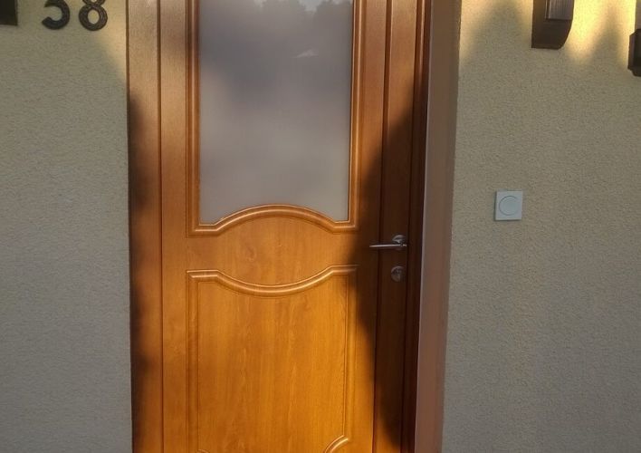Porte d'entrée en fenêtres PVC VOUJEAUCOURT