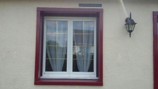 Fenêtre PVC T70 avec croisillons laitons.