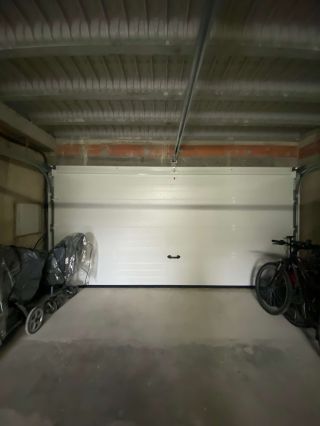 Porte de garage sectionnelle Evolution motorisée.