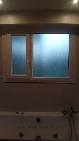 Fenêtres PVC T70 blanches avec oscillobattants.