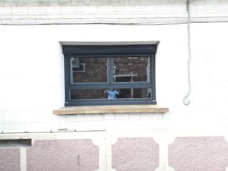 Installation fenêtres PVC gris anthracite perlé