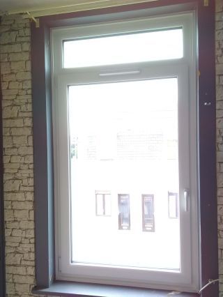 Porte d'entrée PVC HARMONIA et Fenêtres triple vitrage T84.