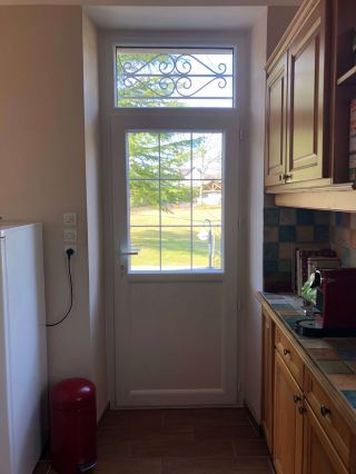 Porte-fenêtre PVC avec vitrage retardateur d'effraction