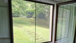Fenêtre PVC avec moustiquaire fixe à VOIRON