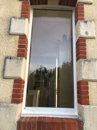 Fenêtres PVC blanches cintrées de qualité.