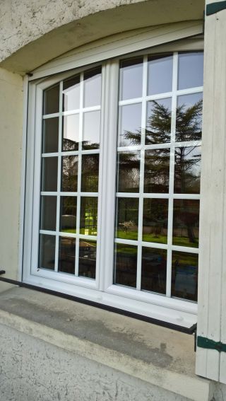 Fenêtres PVC blanc cintrées de qualité