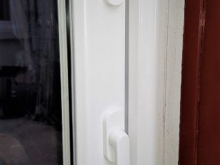 Porte-fenêtre PVC T70, serrure et poignée extra plate